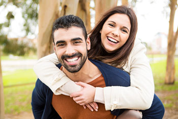 Young couple laughing after LASIK