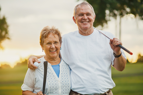 Couple playing golf