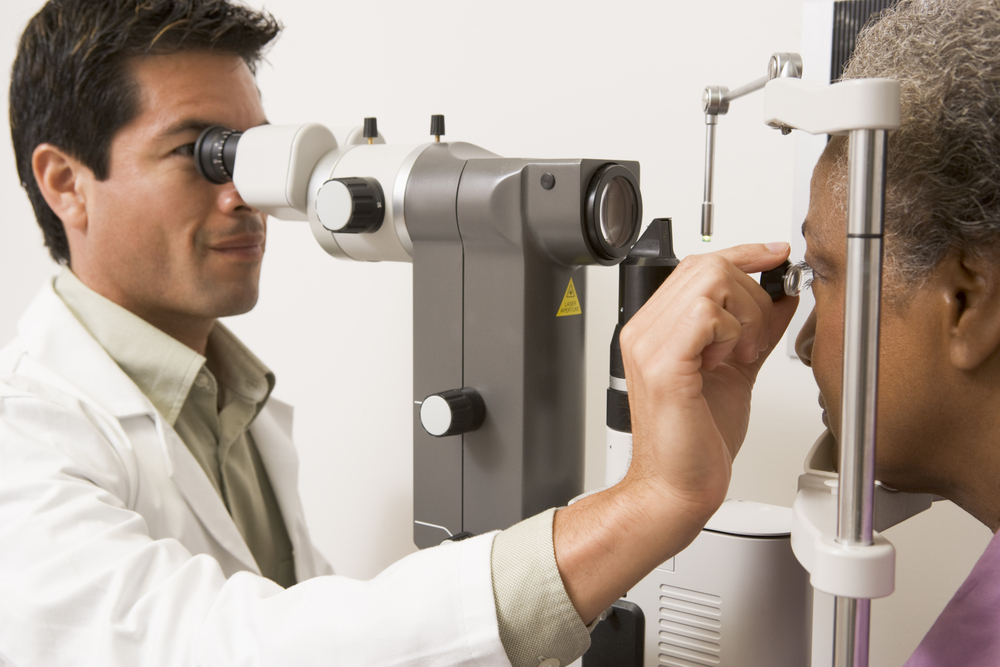 Ophthalmologist giving a patient an Eye Exam